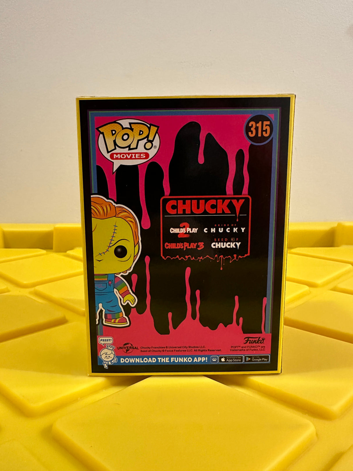 Funko POP! Chucky (Black Light) - Limited Edition Entertainment Earth Exclusive