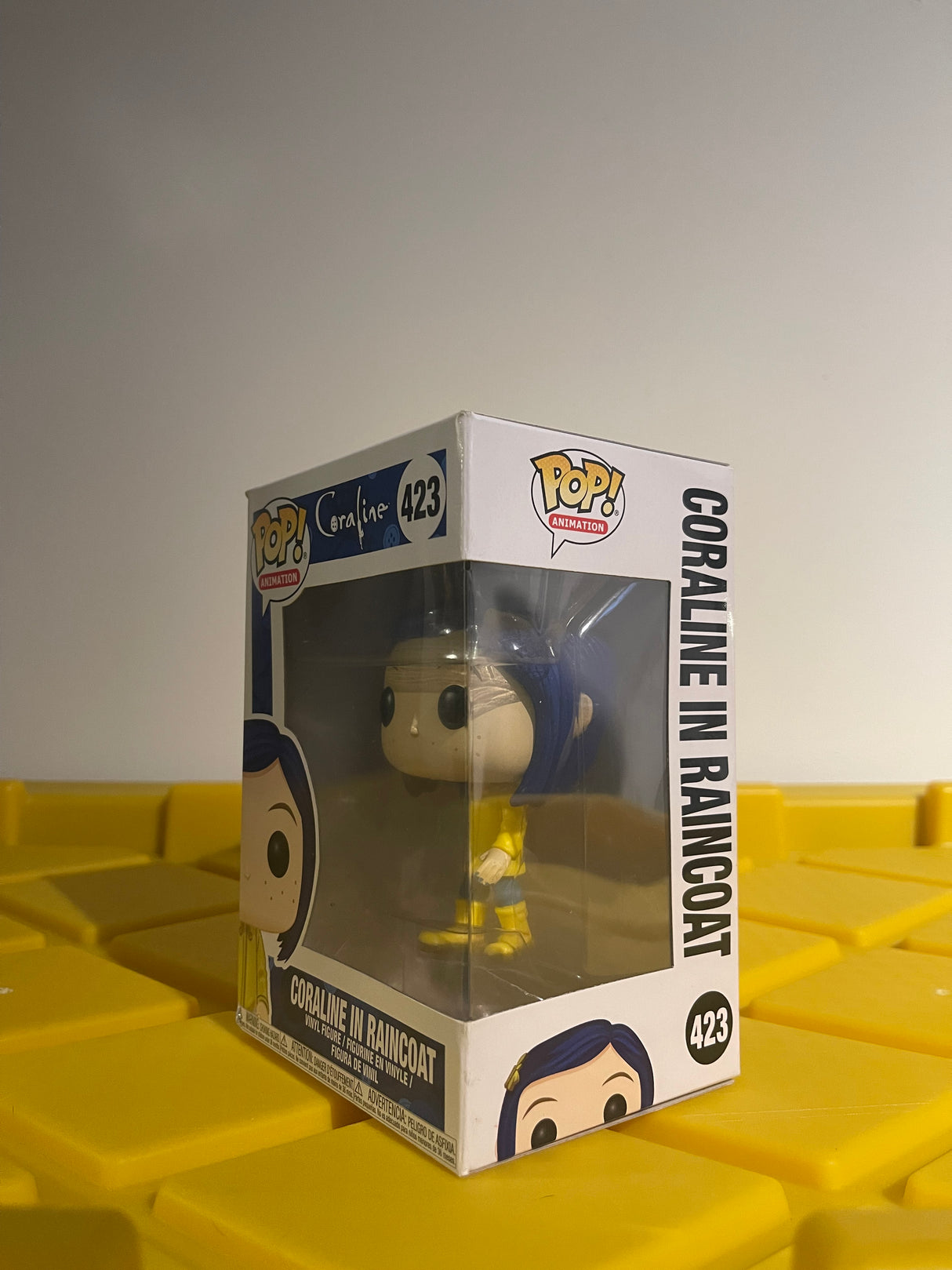 Coraline In Raincoat